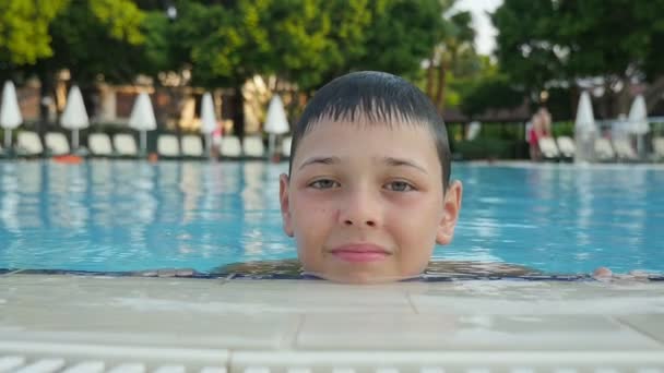 Cheery Child Smiles Edge Swimming Pool Summer Slow Motion Portrait — Stock Video