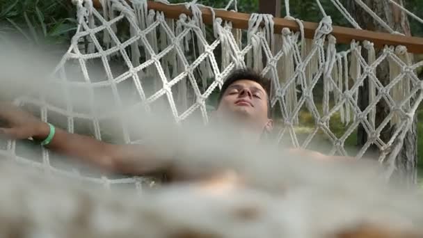 Sportive Young Man Sleeping Swaying Hammock Summer Slow Motion Amusing — Stock Video