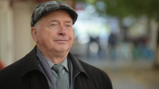 Clean Cut Old Man Flat Cap Standing Looking Optimistically Outdoors — Stock Video