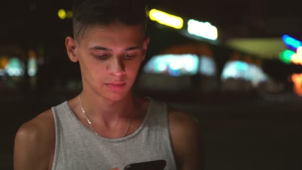Smart Young Man Surfing Net His Phone City Street Night — Stock Video