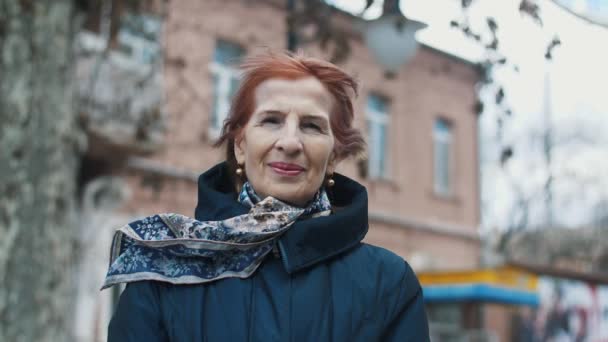 Elegant Senior Woman Smiling Walking Street Winter Slow Motion Positive — Stock Video