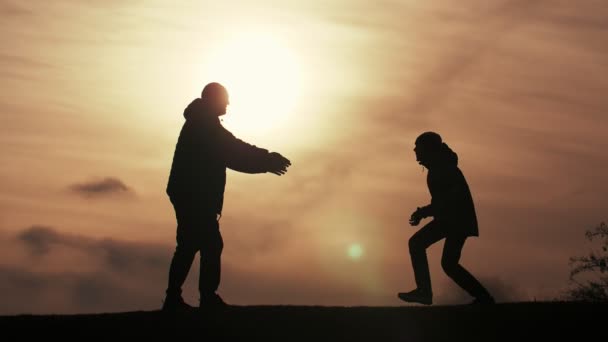 Cheery Father Catching His Jumping Son Lawn Dark Sunset Spring — Stock Video