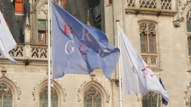 Three White Blue Flags Bruges Words Fluttering Belgium Slo Impressive — Stock Video