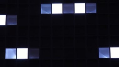 Belçika'da bir gece kulübünde yanan mavi kareler hatları neşeli ışık müzik Belçika'da bir gece kulübünde neşeli oynarken mavi, beyaz ve turuncu kareler açık ve kapalı ışıklı kareler Amazing görünümü 