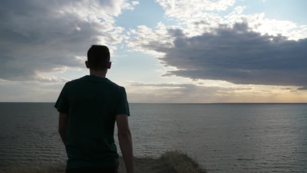 Young Brunette Man Going Sea Coast Edge Raising His Hands — Stock Video