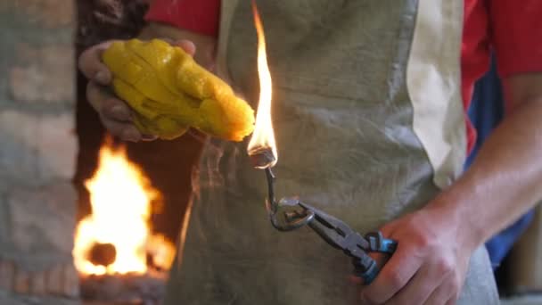 Skillful Man Touching Metallic Rose Burning Wax Making Masterpiece