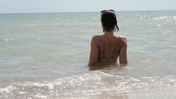 Elegant Girl Bikini Sitting Black Sea Waters Sunny Day Slo — Stock Video
