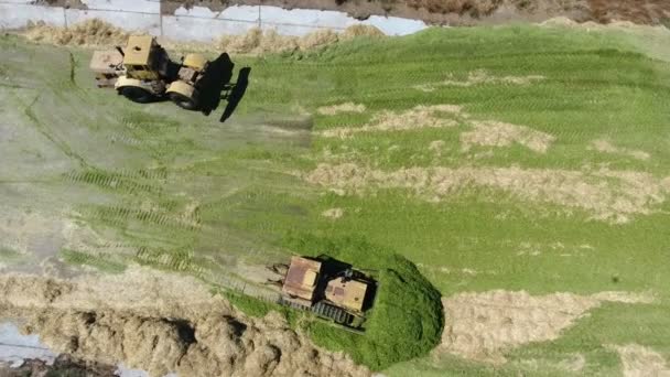 Aerial Shot Two Bulldozers Moving Silo Storage Sunny Day Summer — Vídeos de Stock