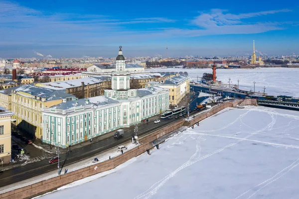 Aerial view from drone Kunstkammer, Rostral column, Peter and Paul Fortress and the Palace Bridge across the Neva River in St. Petersburg — Stock Photo, Image