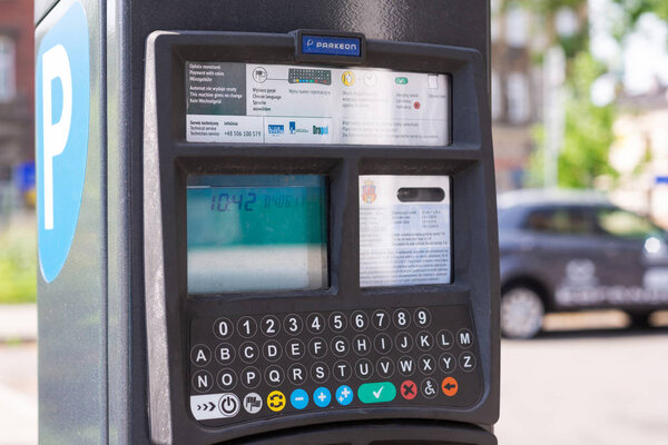 KRAKOW, POLAND - JUNE, 2017: Parking machine in the city street. Pay On Foot Parking System 