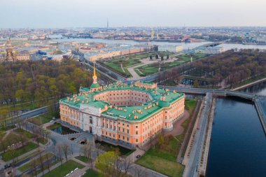 Saint-Petersburg. Russia. Panorama of St. Petersburg city at summer sunset. Engineering castle top view. Mikhailovsky castle. Architectural monuments of Petersburg. Museums of St. Petersburg.  clipart