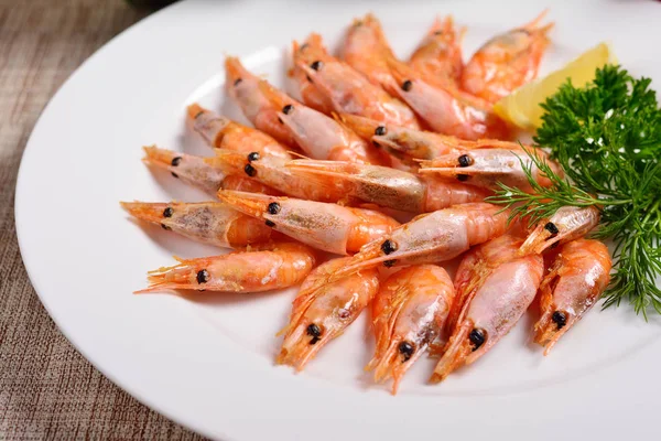 Shrimp on a white plate, menu concept — Stock Photo, Image