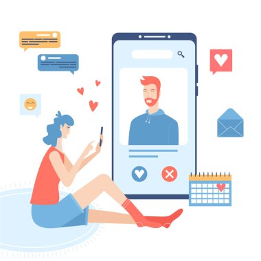 Akıllı telefon uygulaması için romantik bir eş arayan genç bir kadın minderde oturuyor..