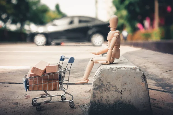 Shopping concept., Mini human model is waiting at car parking lot.