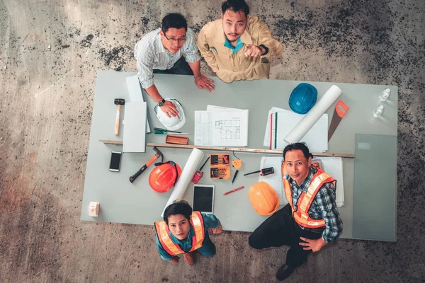 Portrait of engineers and architects are site visit and inspection together for their project., Unity and teamwork concept.