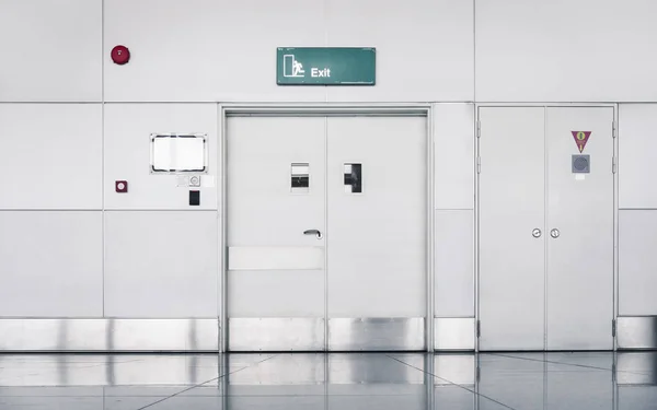 Steel securities door and fire protection system in airport terminal.