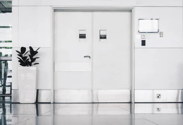 Steel securities door and fire protection system in airport terminal.