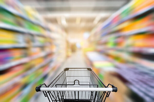 Shopping trolley in supermarket store., Abstract motion blurred.