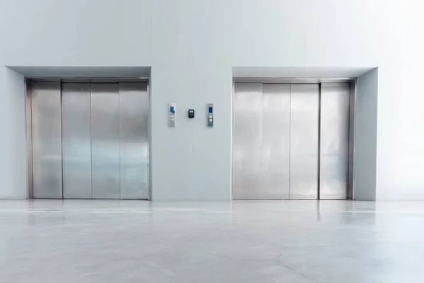 Modern Elevator and Interior Decoration of Lobby Entrance Flooring, Steel Door Accessibility Gate Elevator of Office Building. Lift Access Doorway in Lobby Hall Room, Hallway Decor Design of Hotel