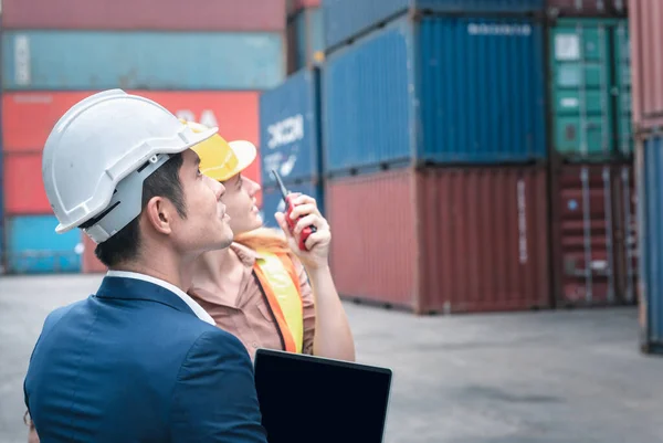 Container Shipping Logistics Engineering of Import/Export Transportation Industry, Transport Engineers Teamwork Controlling Management Containers Together at Port Ship Loading Dock. Business Team