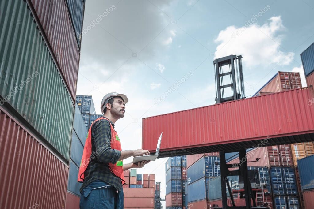 Container Supervisor Control Import/Export While Inspecting Containers Box in Warehouse Storage Distribution. Container Logistics Shipping Controlling of Transportation Industry, Cargo Ship Factory