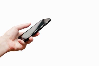 Bir cep telefonu tutan el. Alay up ve connetcion kavramı. Avrupa, eller, beyaz abstrack arka plan. yakın kadar izole.