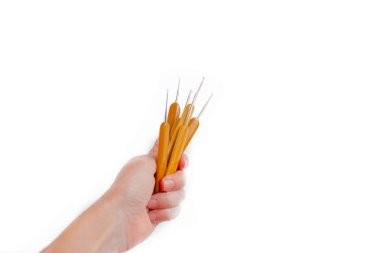 Ahşap örgü için kanca oluşturur. Sarı ahşap handls örgü için rahat. Demir kanca bir