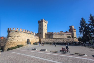 Castello di Vigoleno, in the Emilia Romagna province of Piacenza, with the walls and the town. Vigoleno 02/17/2019 at 12:30 pm clipart