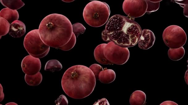 Falling pomegranate on a black background — Stock Video