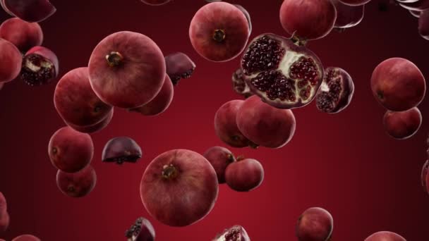 Padající granátové jablko na červeném pozadí — Stock video
