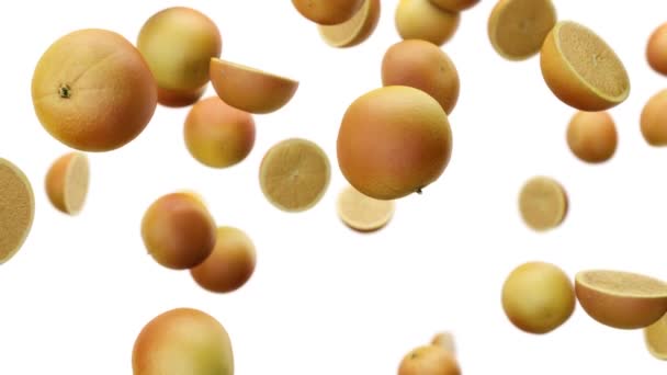 Naranjas que caen lentamente sobre un fondo blanco — Vídeos de Stock