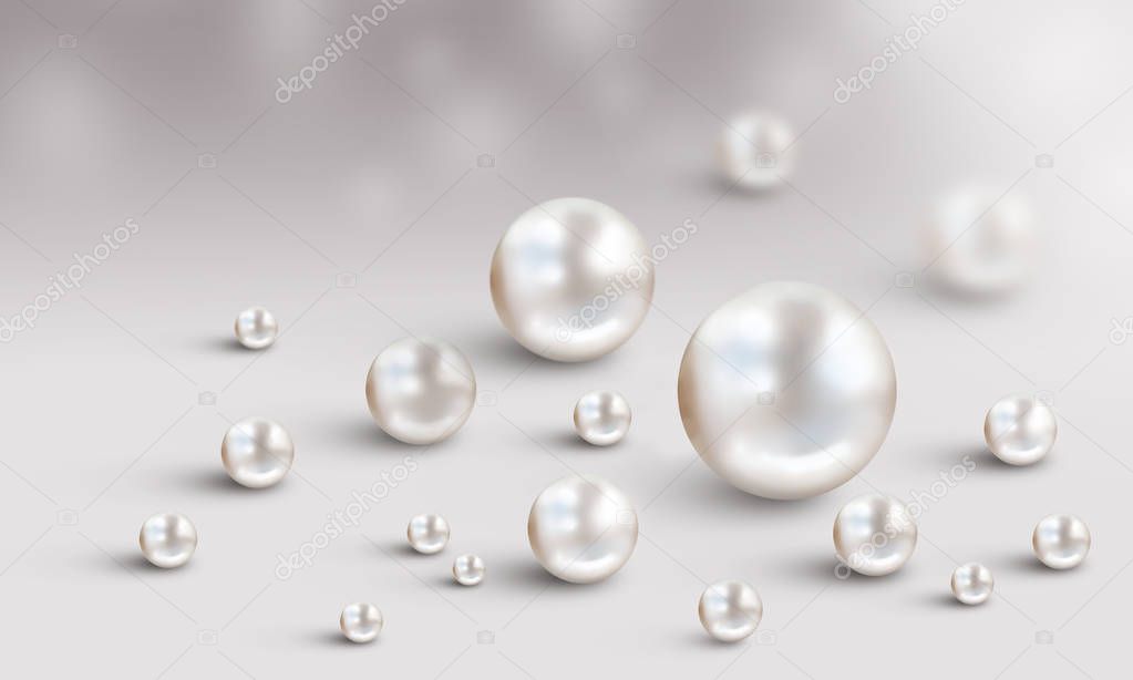 Wedding pearl background with many small and big white shiny nacreous pearls isolated on white and grey satin bokeh background - space for your text