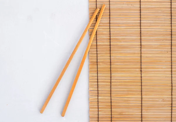 Reed mat - üstten görünüm fotoğraf metin için yer ile Chopsticks