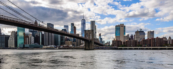NYC Skyline from Brooklyn Bridge Park in the district of Brooklyn, New York, USA