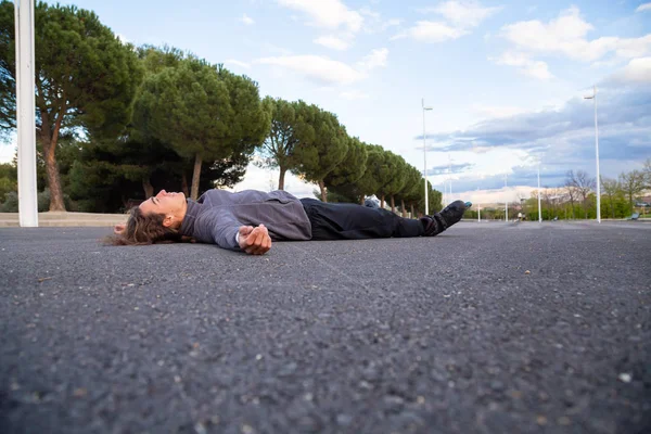 Young Fit Weary Man Sportswear Roller Skates Lying Road Beautiful — Stock Photo, Image