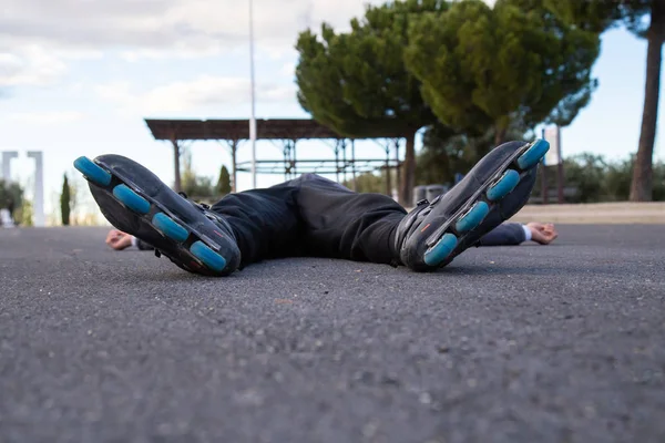 Young Fit Weary Man Sportswear Roller Skates Lying Road Beautiful — Stock Photo, Image