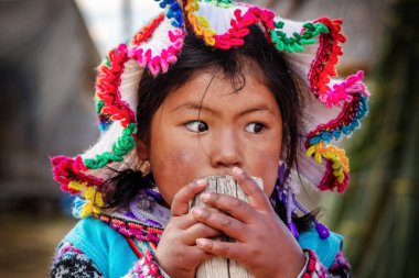Young peruvian girl, Lake Titicaca, Peru. 