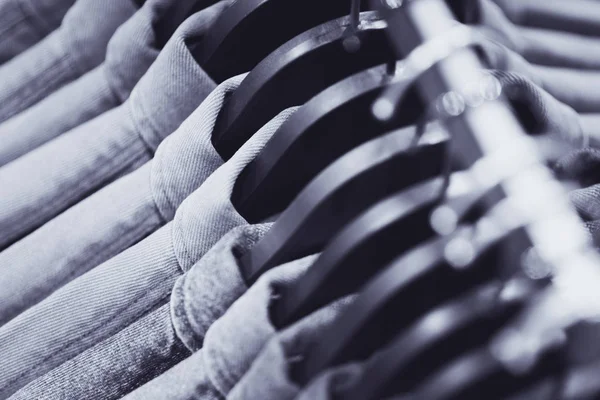 Row Denim Jackets Shirts Black Hangers Top View Closeup Jeans — Stock Photo, Image