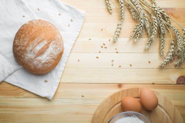 taze ekmek, un, yumurta ve buğday kulak mutfak natürmort. Yemek, tasarım, TOPVIEW için arka plan için seviyorum