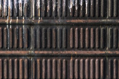 Eski demirin dokusu kırmızı ve kahverengidir. Metin için arka plan.