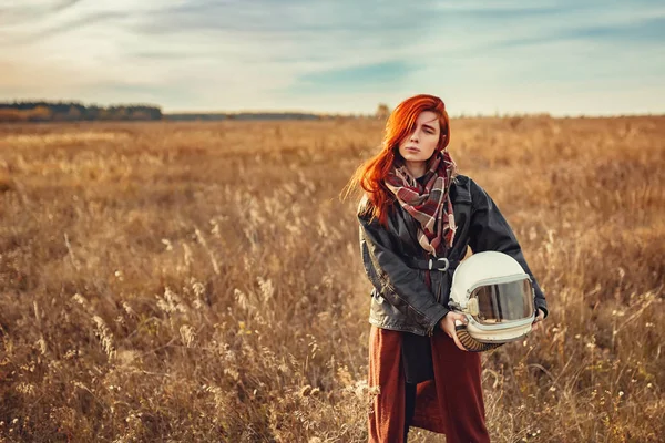 Redhead girl in black leather jacket and helmet — Stock Photo, Image