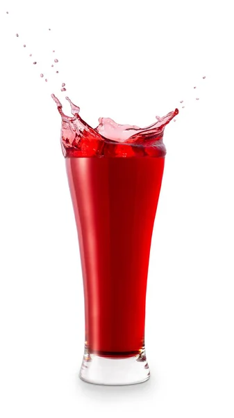 Glass of splashing juice — Stock Photo, Image