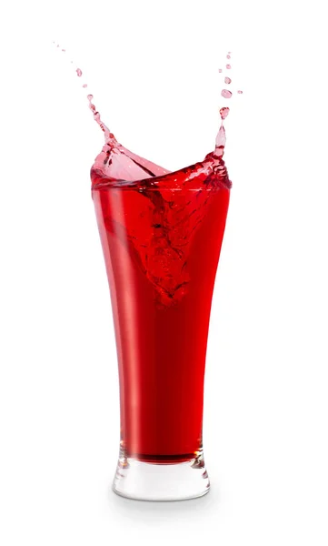 Glass of splashing juice — Stock Photo, Image