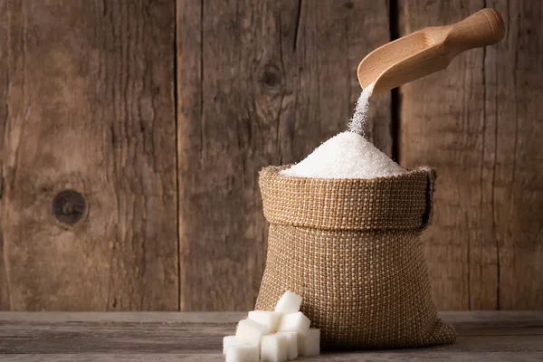 Sugar in burlap sack — Stock Photo, Image