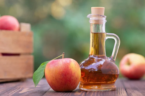 apple vinegar in glass pitcher