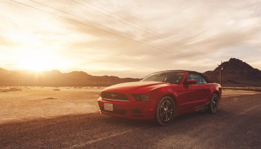 BONNEVILLE ,UTAH, USA JUNE 4, 2015: Photo of a Ford Mustang Convertible 2012 version at Bonneville Salt Flats,Utah,USA. The fifth generation began with the 2005 model year to 2014. clipart