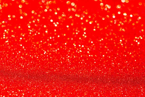 Abstract Red Xmas festive background. Christmas bokeh glitter background. Backdrop for poster, flyer, brochure and party events.