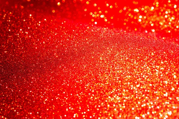 Abstract Red Xmas festive background. Christmas bokeh glitter background. Backdrop for poster, flyer, brochure and party events.