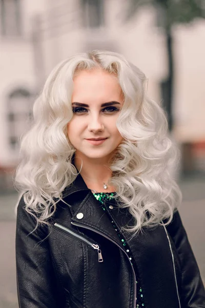 beautiful girl with silver hair in a leather jacket