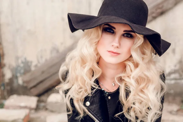 beautiful girl with silver hair in a leather jacket